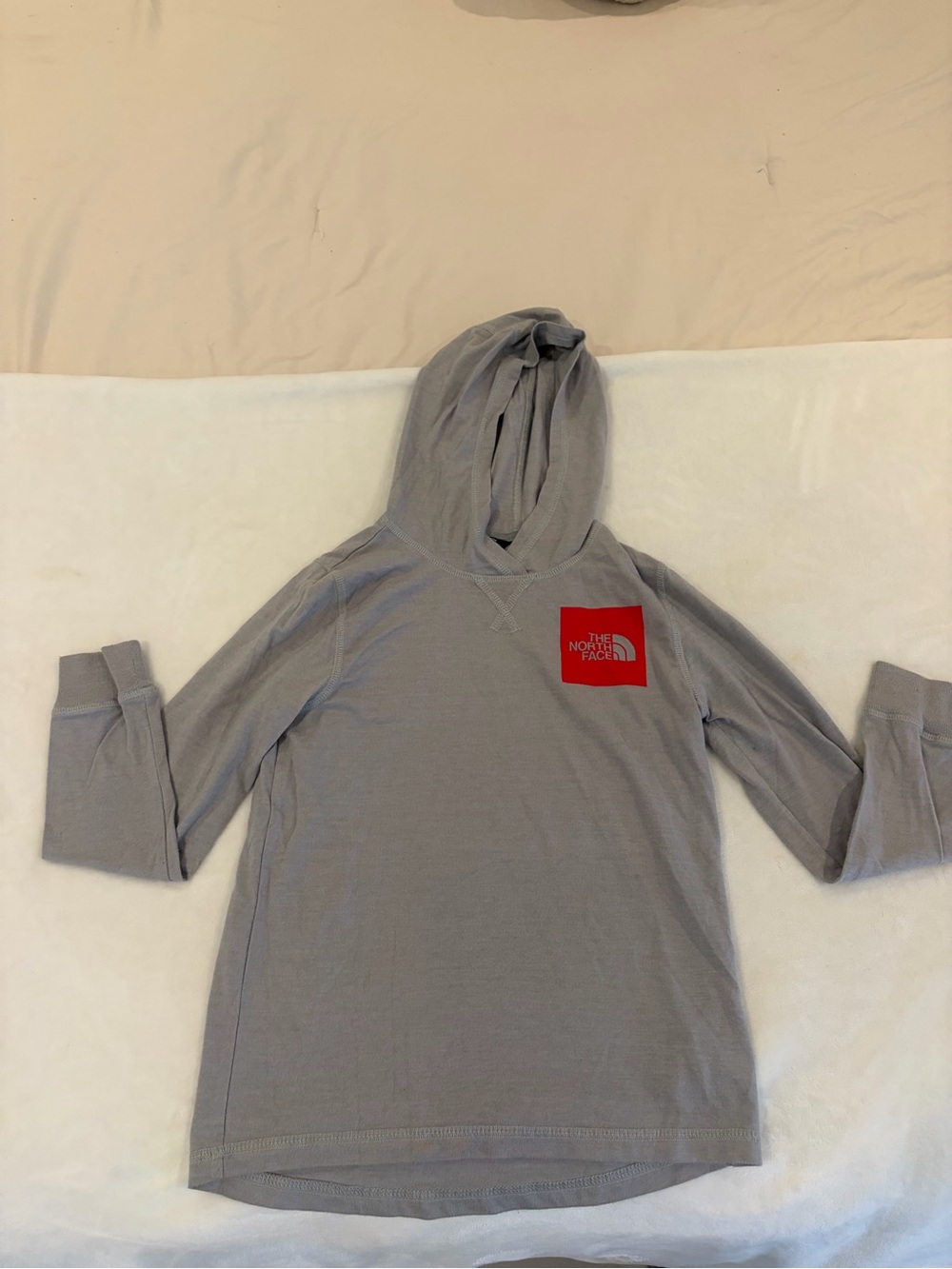 The North Face Kids Light Gray Hoodie with Red Logo Patch